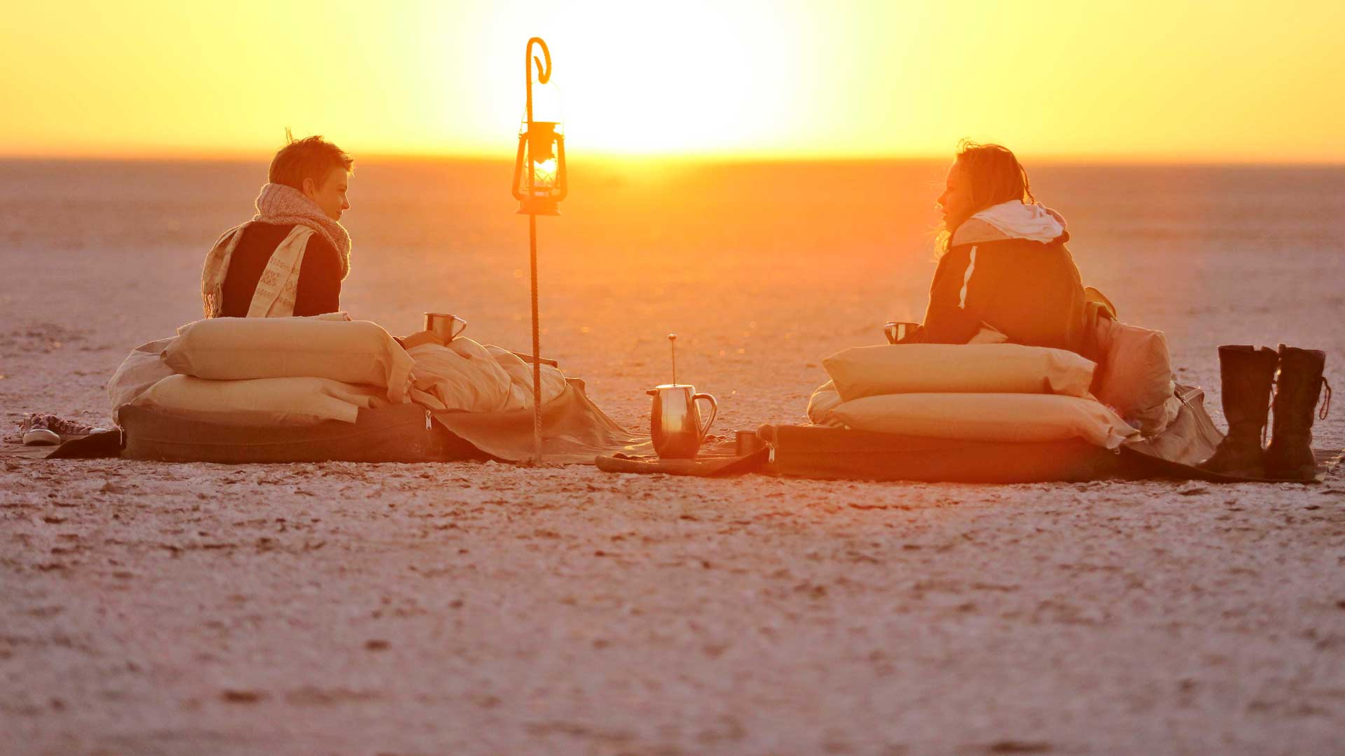 sundowners in the great plains of serengeti
