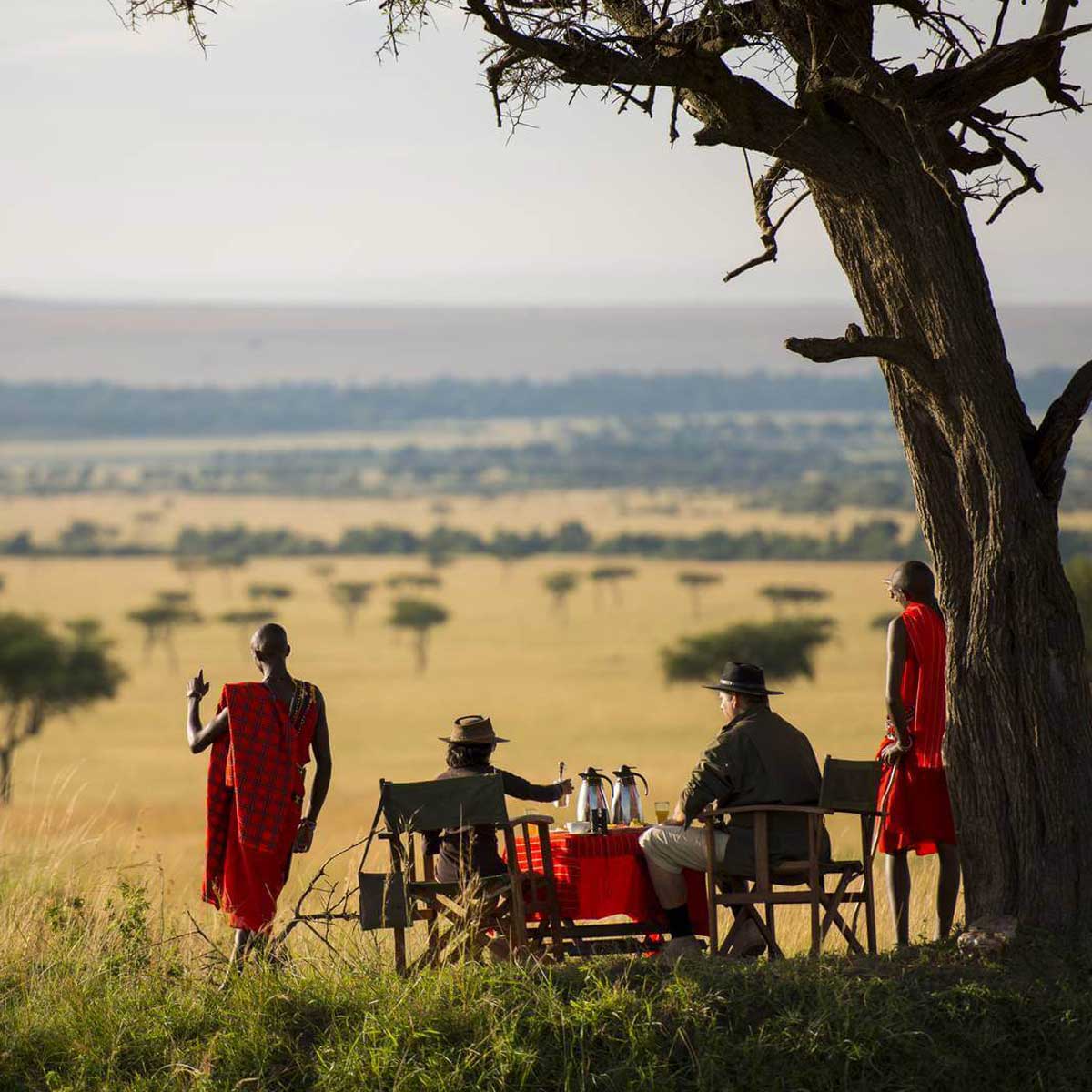 guest getting local insight from a maasai elder man