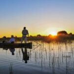 tourist enjoying canoeing at lake natron