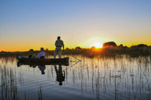 tourist enjoying canoeing at lake natron